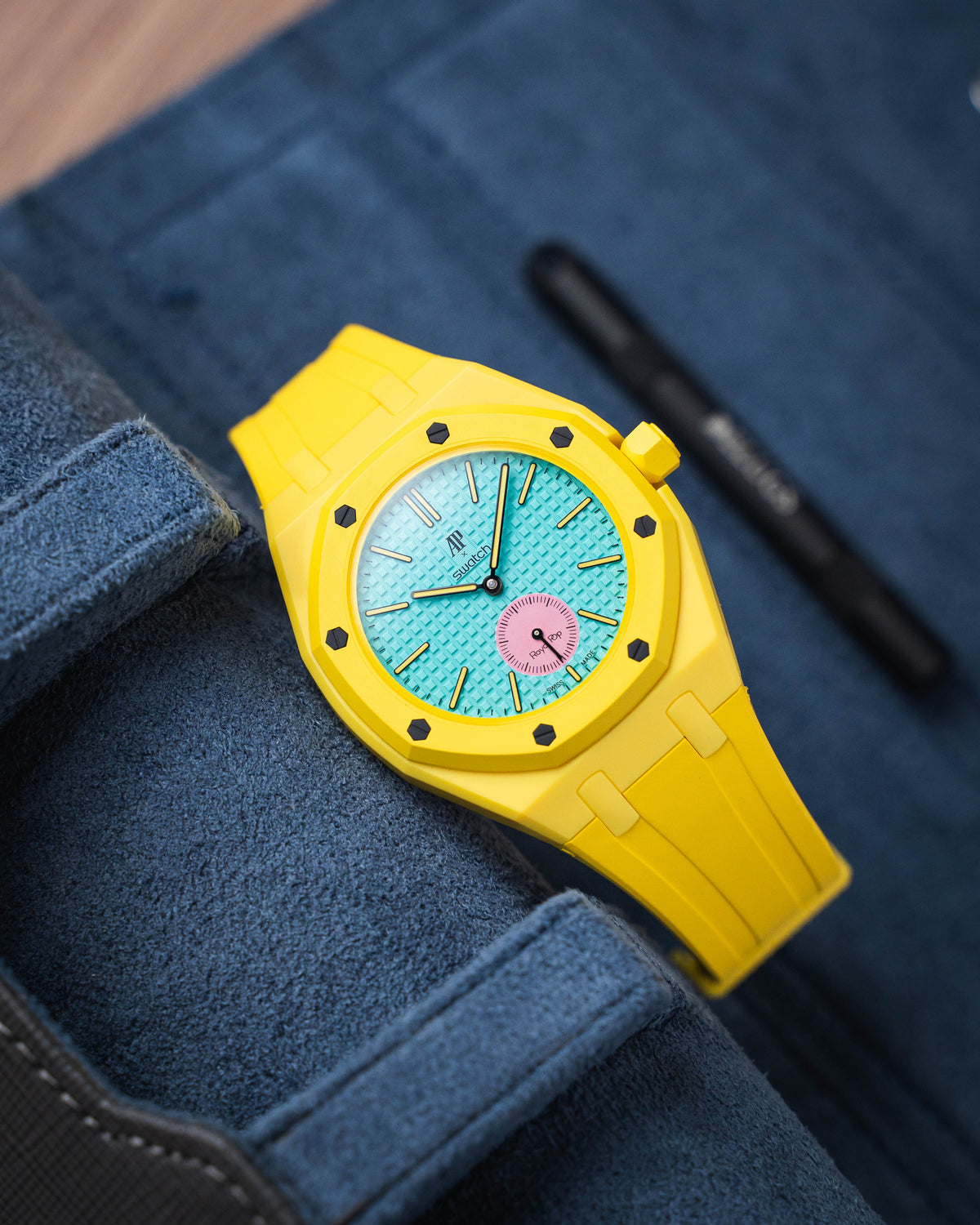 Swatch x Audemars Piguet Royal Pop worn on a Delugs case-strap