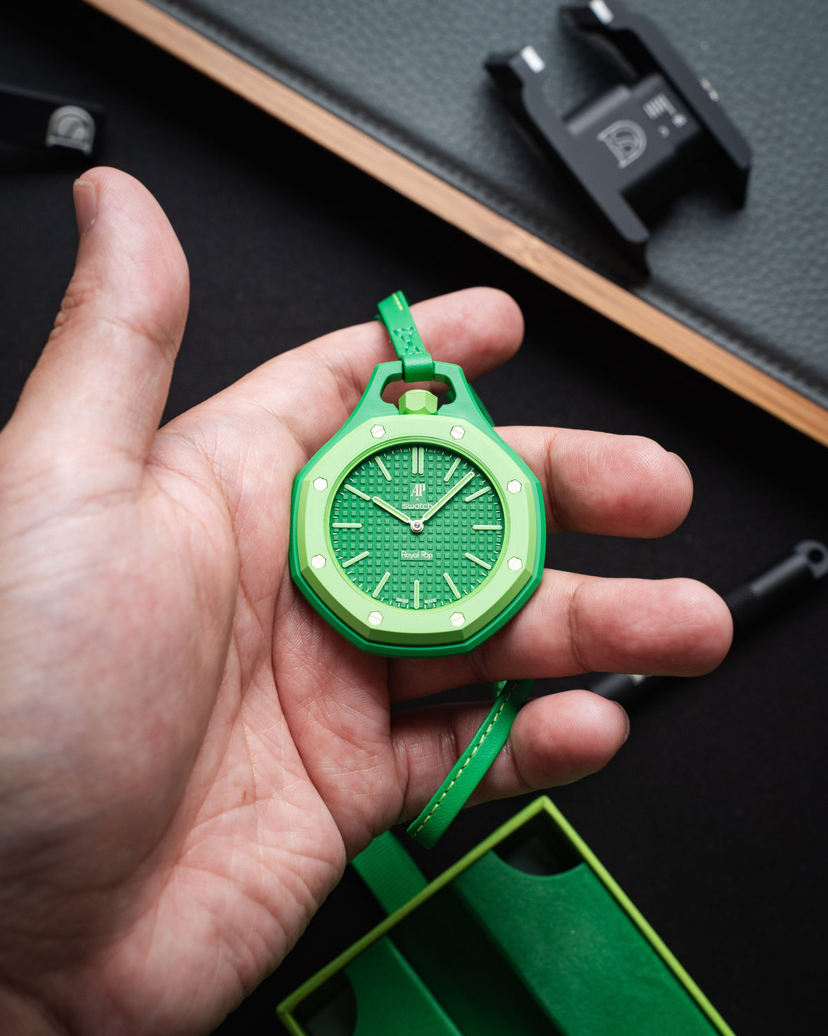 Swatch x Audemars Piguet Royal Pop worn on a Delugs case-strap